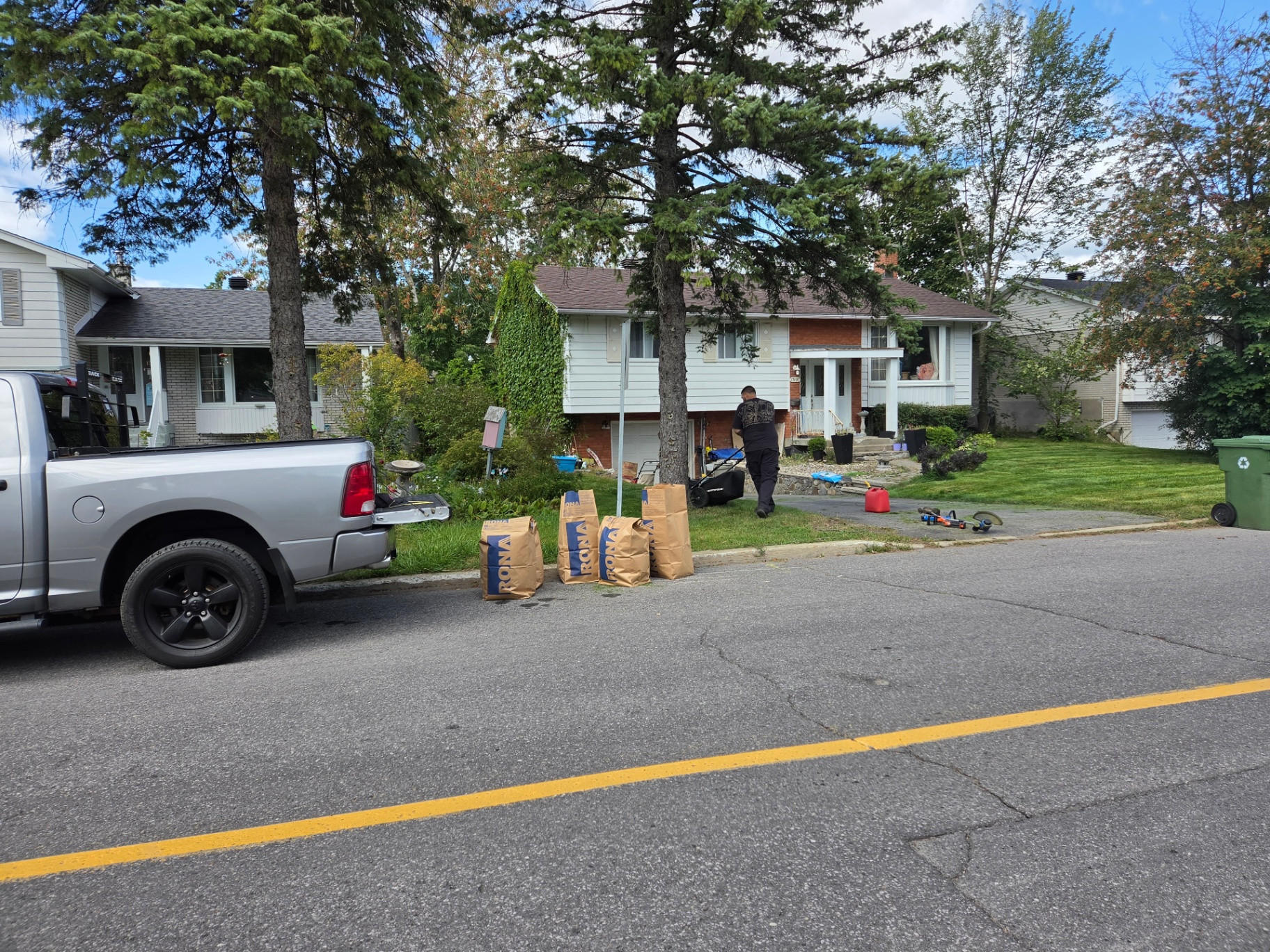 MJ Landscaping crew completing a residential property cleanup